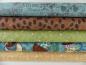 Preview: Verschiedene Patchworkstoffe von Clothworks aus der Serie Coffee House .