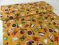 Preview: Patchworkstoff mit bunten Tassen auf gelbem Untergrund von Quilting Treasures aus der Serie Daily Grind.