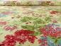Preview: Patchworkstoff. Sommerblumen auf pastellgelbem Hintergrund.