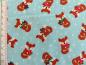 Preview: Patchworkstoff mit Füchsen mit Schal und Schneeflocken auf hellblau. Von Timeless Treasures. Detailansicht mit Maß.
