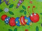 Preview: Patchworkstoff von Timeless Treasures mit Raupe auf grün. Nahansicht.