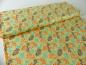 Preview: Patchworkstoff, Meterware von Moda aus der Serie Refresh. Blüten in apricot und mint auf gelben Untergrund.