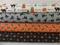 Preview: Verschiedene Patchworkstoffe aus der Serie Spooky Delights von Moda.