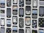 Preview: Stoff von Windham Fabrics mit Handy,  Mobiltelefon, Telefonen auf weiß.