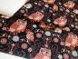 Preview: Patchworkstoff in schwarz und braun mit großen Eulen.