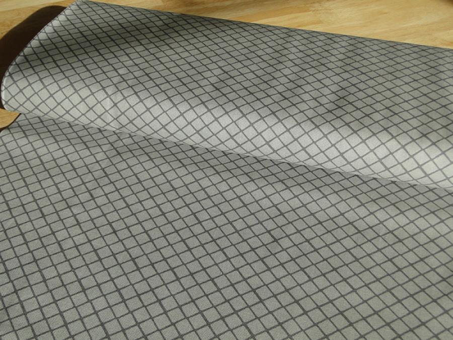 Patchworkstoff, Meterware mit einem karierten Gitter-Muster.