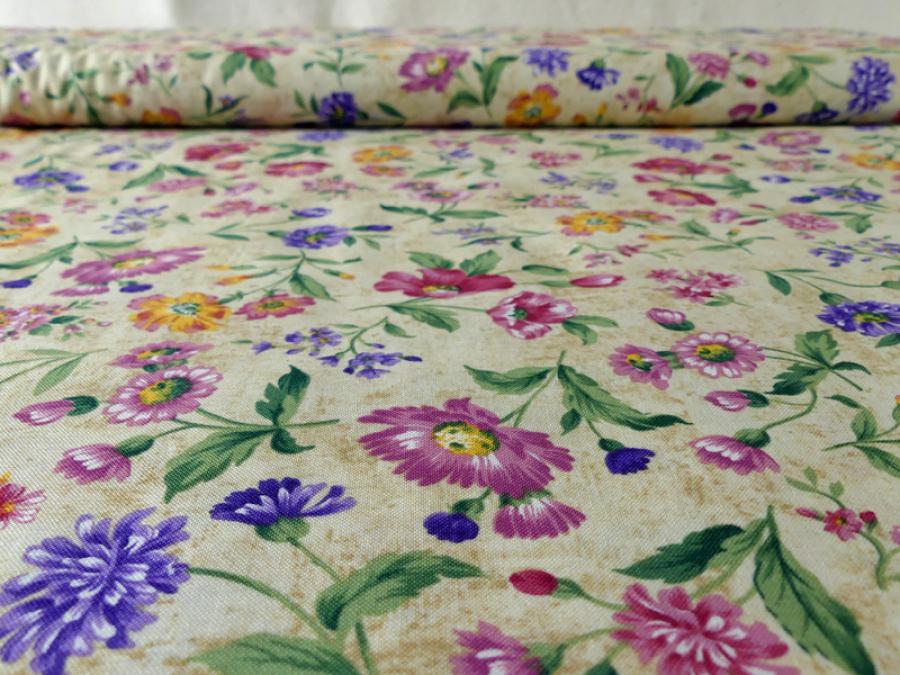 Preview: Stoff mit vielen bunten Blumen in pink, lila, rot, gelb und mehr. Von Timeless Treasures.