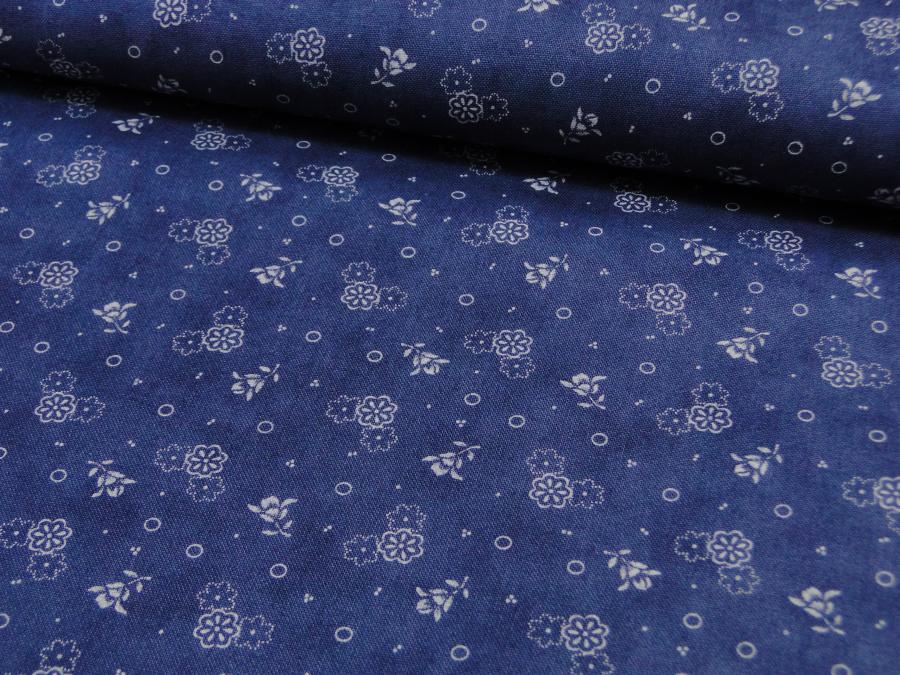 Patchworkstoff, Meterware. Kleine weiße Blüten auf blauem Untergrund. Lexington von Moda.