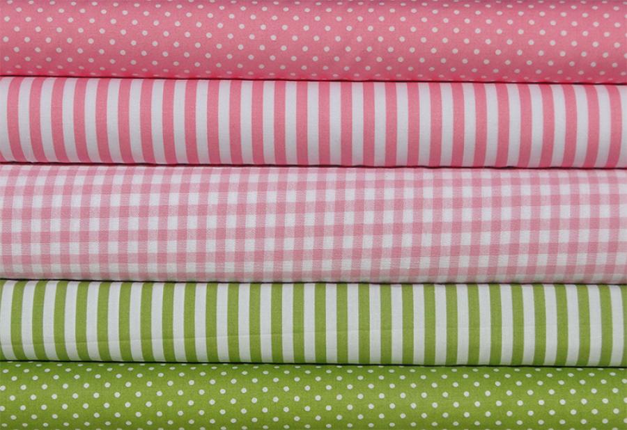 Preview: Verschiedene Baumwollstoffe in rosa und grün.
