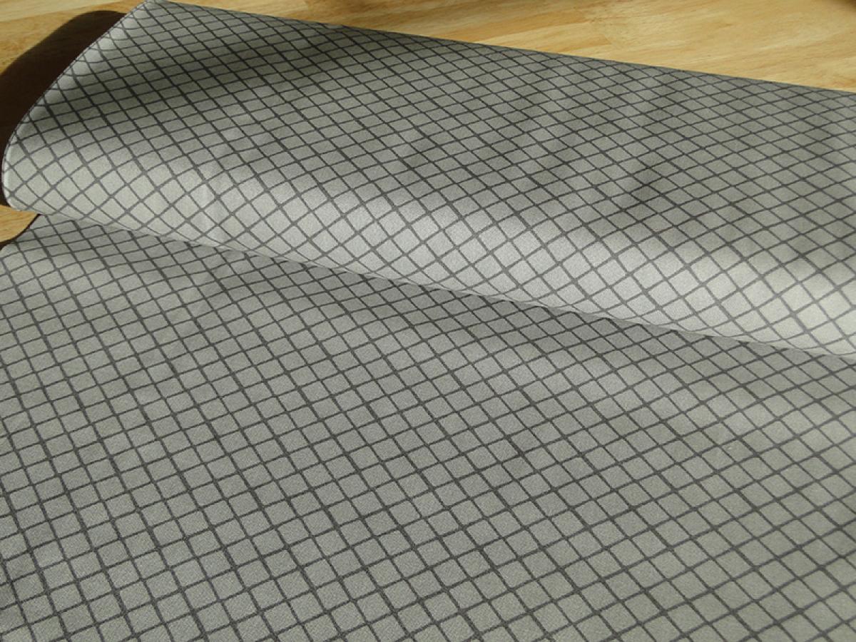 Patchworkstoff, Meterware mit einem karierten Gitter-Muster.
