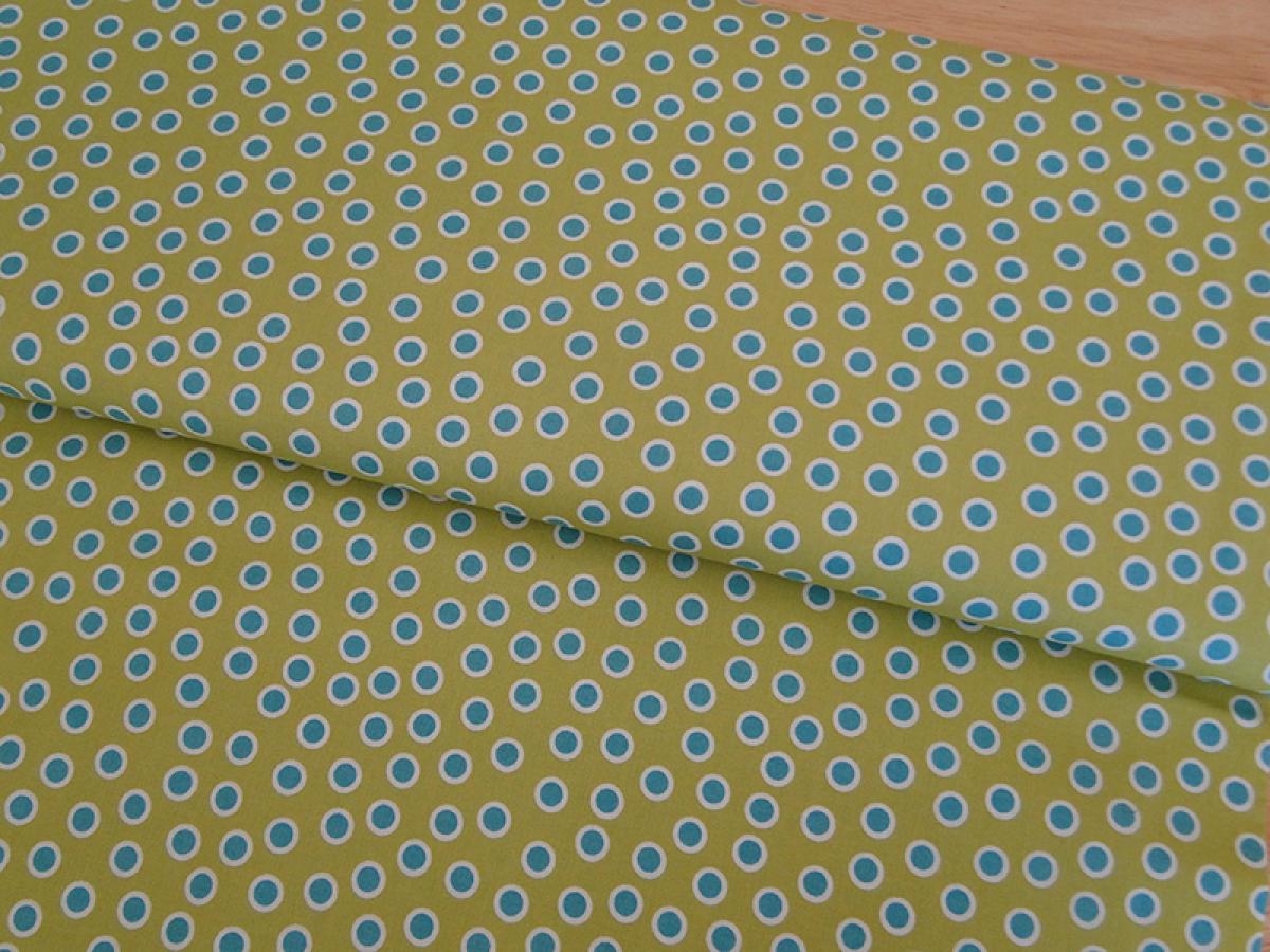 Patchworkstoff, Meterware von Extraordinary. Hintergrund grün mit Punkten in petrol und weiß.